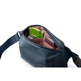 Bellroy Laneway Belt Bag in navy with organized interior compartments and durable recycled fabric lining