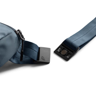 Bellroy Laneway Belt Bag showing blue strap and magnetic buckle detail on white background