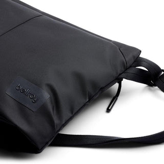 Bellroy Laneway Sacoche in black recycled nylon with adjustable strap and subtle logo patch detail