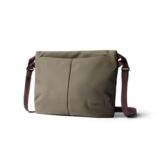 Bellroy Laneway Sacoche in muted olive with smooth recycled nylon fabric and adjustable maroon strap