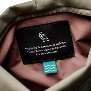 Bellroy Laneway Sacoche interior label showing durable fabric and eco-friendly stitching details