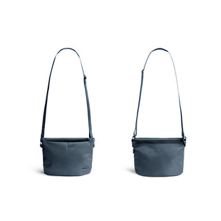 Bellroy Laneway Sacoche in deep blue recycled nylon fabric shown front and back view with adjustable strap