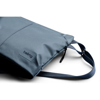 Bellroy Laneway Sacoche in slate blue recycled nylon with adjustable shoulder strap and sleek texture