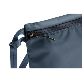 Bellroy Laneway Sacoche in dark blue with smooth recycled nylon fabric and zipper detail close-up