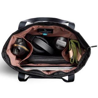 Bellroy Laneway Totepack in black showing organized interior with tech, headphones, and accessories compartments