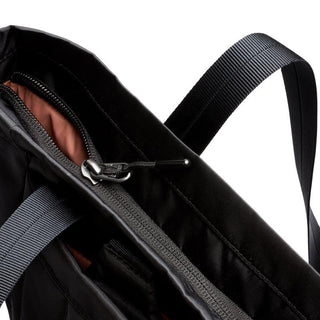 Bellroy Laneway Totepack close-up on black fabric and zipper detail with shoulder strap visible