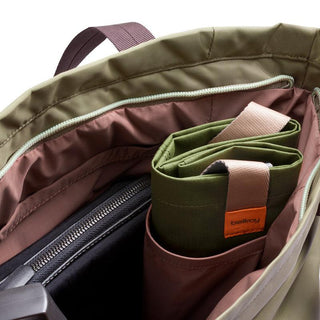 Bellroy Laneway Totepack showing organized internal compartments with olive green fabric insert and zipper pocket