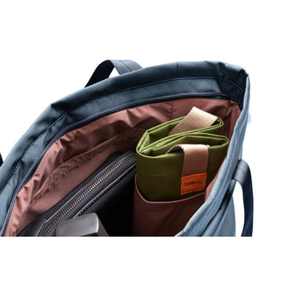 Bellroy Laneway Totepack open top showing organized interior with green fabric pouch and brown lining