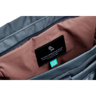 Interior view of Bellroy Laneway Totepack showing brown lining with a sewn-in label and zipper pocket detail