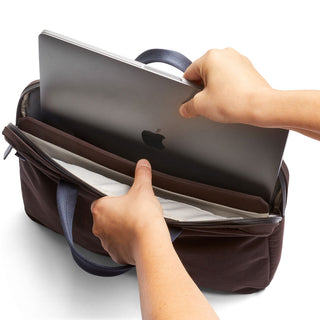 Bellroy Tokyo Laptop Bag 14" in dark fabric with padded laptop compartment and navy handles