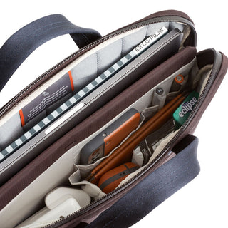 Bellroy Tokyo Laptop Bag 14" open with organized compartments showing tech and accessories inside