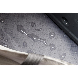 Bellroy Lite Cooler Tote 16L showing water-resistant textured interior lining with droplets on surface