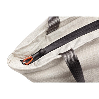 Bellroy Lite Cooler Tote 16L close-up of textured fabric and sturdy black zipper with orange pull loop