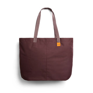 Bellroy Market Tote in deep brown recycled nylon with long shoulder straps and orange logo tag