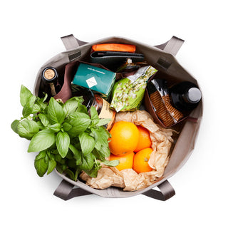 Bellroy Market Tote filled with groceries showing its spacious interior and recycled nylon fabric texture