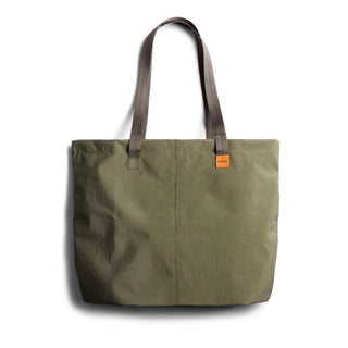Bellroy Market Tote in olive green recycled nylon with brown handles and minimalist design detail