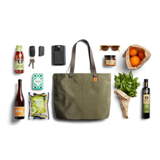 Bellroy Market Tote in olive green recycled nylon with sturdy handles and spacious interior shown with groceries and essentials
