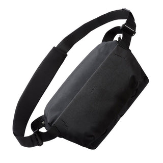 Black Bellroy Venture Sling 10L - Camera Edition with adjustable strap shown at an angle