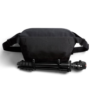 Bellroy Venture Sling 10L - Camera Edition with black recycled fabric and tripod strapped on front panel