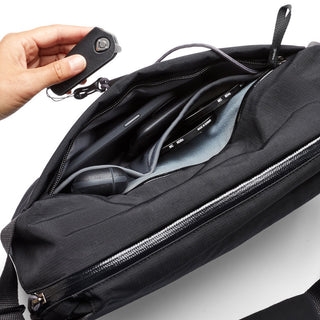 Bellroy Venture Sling 10L - Camera Edition black crossbody bag with organized internal compartments and zipper closure