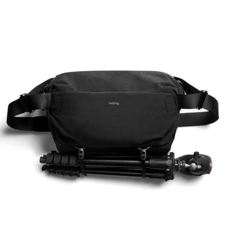 Bellroy Venture Sling 10L - Camera Edition with black recycled nylon fabric and attached camera tripod