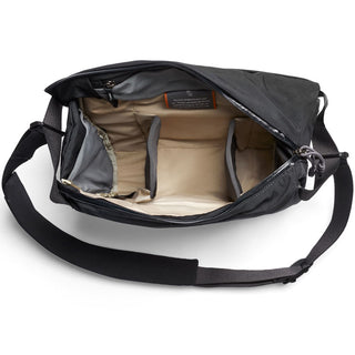 Bellroy Venture Sling 10L - Camera Edition open black crossbody bag with padded beige camera compartments