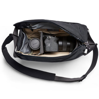Bellroy Venture Sling 10L - Camera Edition open showing padded interior with camera and lens inside