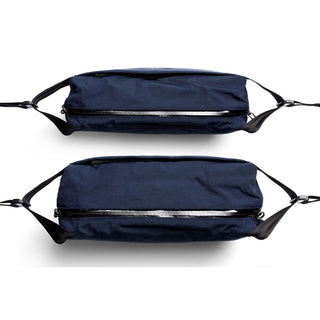 Bellroy Venture Sling 10L - Camera Edition in navy blue with sleek top zipper and adjustable straps