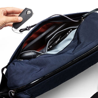 Bellroy Venture Sling 10L - Camera Edition in navy with organized interior and tech accessories inside