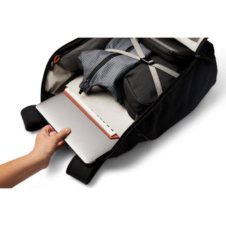 Bellroy Venture Travel Pack 26L open showing organized interior with laptop and packed items inside