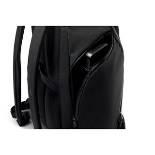 Bellroy Venture Travel Pack 26L in black showing side pocket with electronic device inside