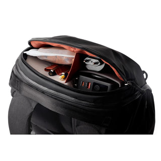 Bellroy Venture Travel Pack 26L in black showing organized interior with multiple compartments and padded lining