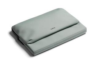 Bellroy Laptop Caddy 16" in muted green recycled fabric with slim, padded design and zip closure