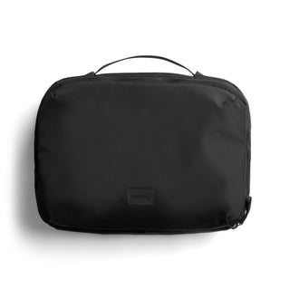 Bellroy Hanging Toiletry Kit Plus in black recycled fabric with top handle and minimalist design