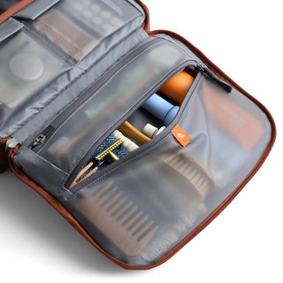 Bellroy Hanging Toiletry Kit Plus unzipped showing organized compartments with travel essentials inside