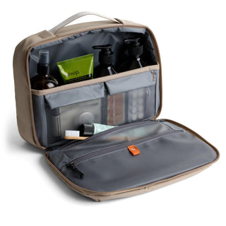 Bellroy Hanging Toiletry Kit Plus in tan with organized compartments and travel essentials inside