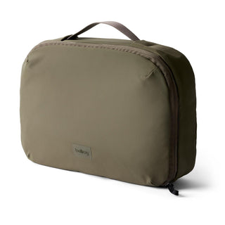 Bellroy Hanging Toiletry Kit Plus in olive green with smooth recycled fabric and top carry handle