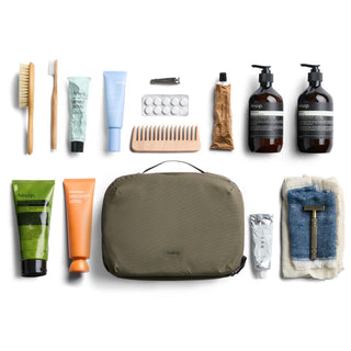 Bellroy Hanging Toiletry Kit Plus in olive with grooming tools and eco-friendly fabric texture