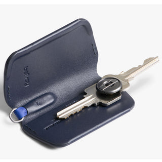 Bellroy Key Cover Third Edition in navy leather with a single key securely held inside its organizer case