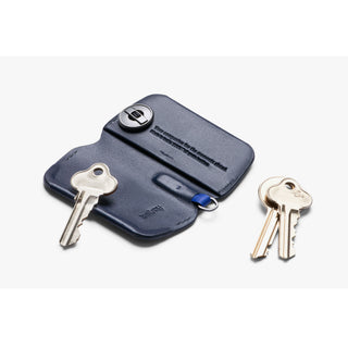 Bellroy Key Cover Third Edition in navy leather open showing key storage and metal key ring detailing