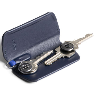 Bellroy Key Cover Plus Third Edition navy leather key organizer with two metal keys inside