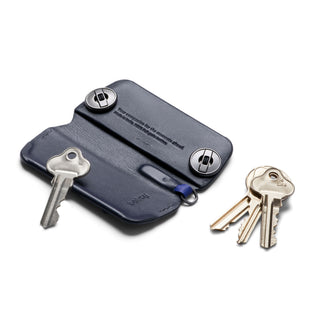 Bellroy Key Cover Plus Third Edition in navy leather with metal screws and attached keys