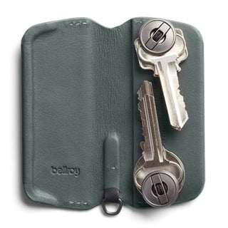 Bellroy Key Cover Plus Third Edition in green leather holding two metal keys inside