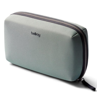 Bellroy Tech Kit in muted green recycled fabric with black zip and compact rectangular shape