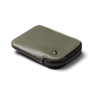 Bellroy Card Pocket in olive leather with silver logo and dark zipper detailing on white background