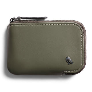 Bellroy Card Pocket in olive green leather with zipper closure and embossed owl logo on corner