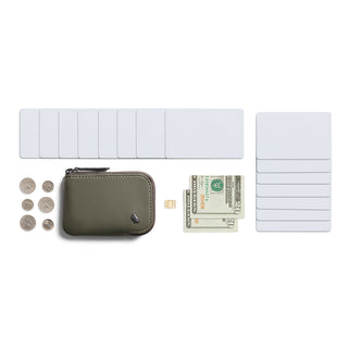 Bellroy Card Pocket in olive leather with zipper, showcasing card slots, cash, and coins on white background