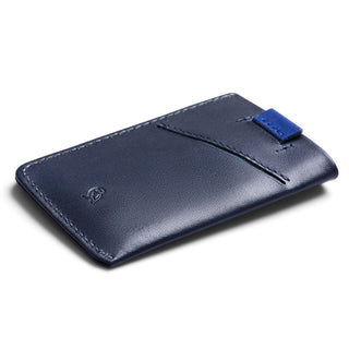 Bellroy Card Sleeve Second Edition in navy leather with slim profile and blue pull tab detail
