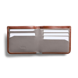 Bellroy Hide & Seek HI wallet open showing multiple card slots in brown and grey leather design