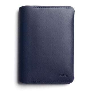 Bellroy Passport Cover in navy smooth leather with subtle logo embossing and clean stitching edges